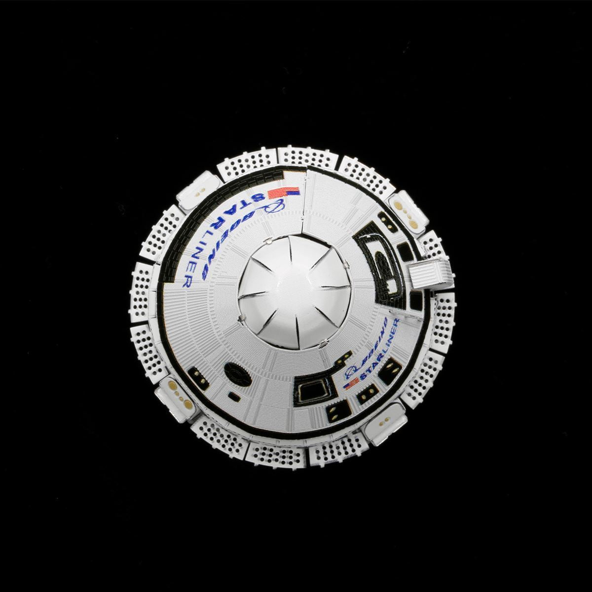 from the top boing starliner with text and symbols on a black background