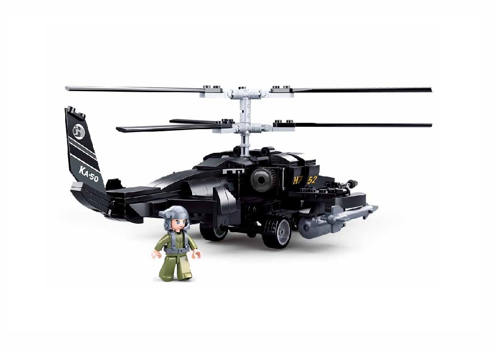 Toy helicopter and figure on a white background