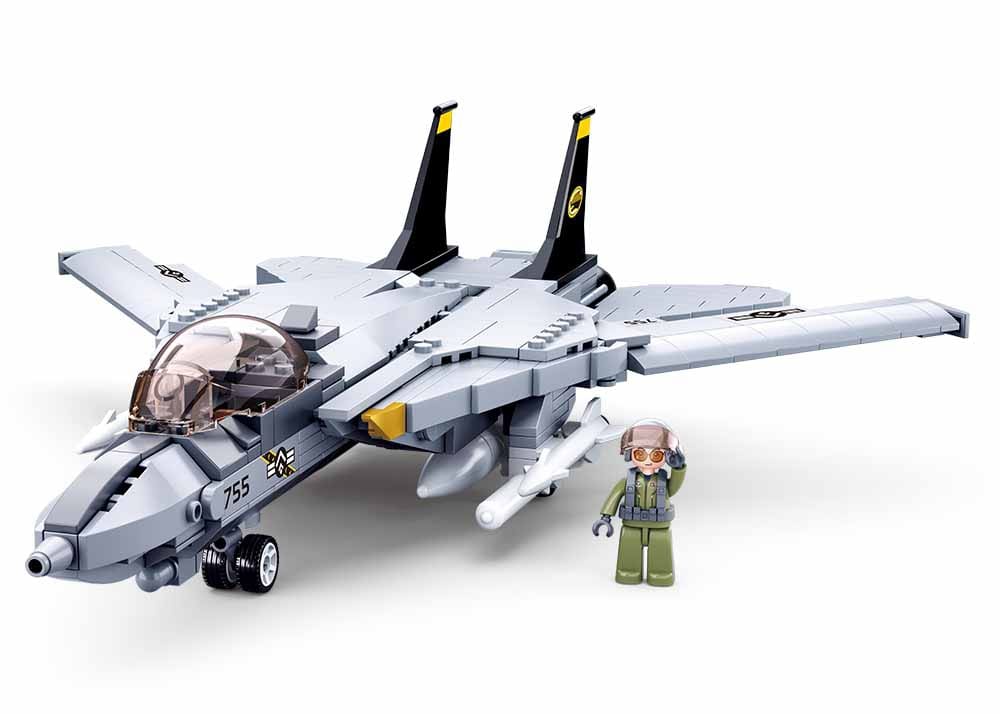 Toy model of a fighter jet with a pilot figure on a white background