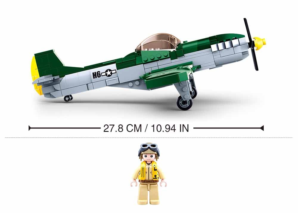 Toy airplane model with a figure for scale on a white background
