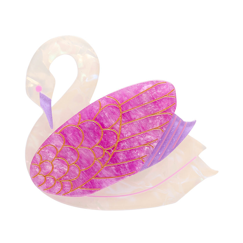 Pink and gold swan-shaped Estwilder Brooch on a white background