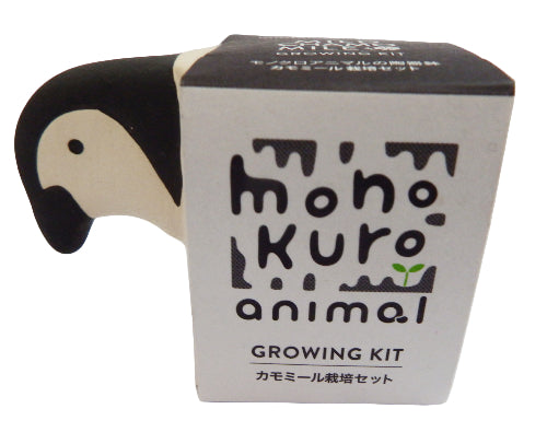 Box with a stylized penguin design and text 'mono kuro animal' on a white background