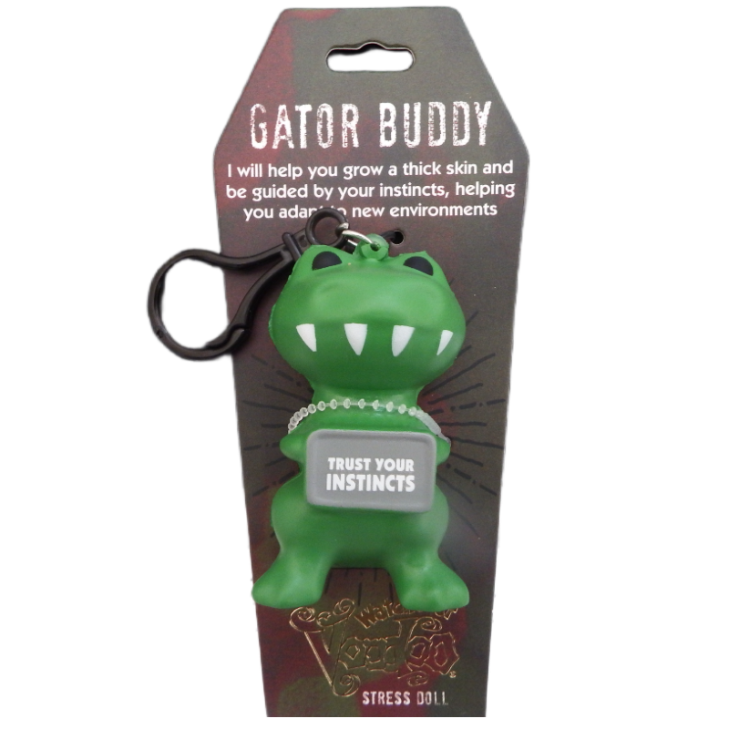 Green gator-shaped stress doll with 'Gator Buddy' packaging on a white background