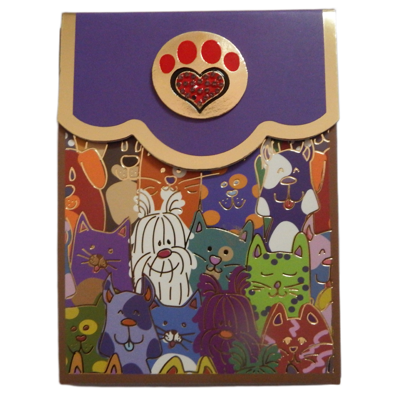 Colorful cat-themed Bling note Pads with a decorative paw print emblem on a purple background