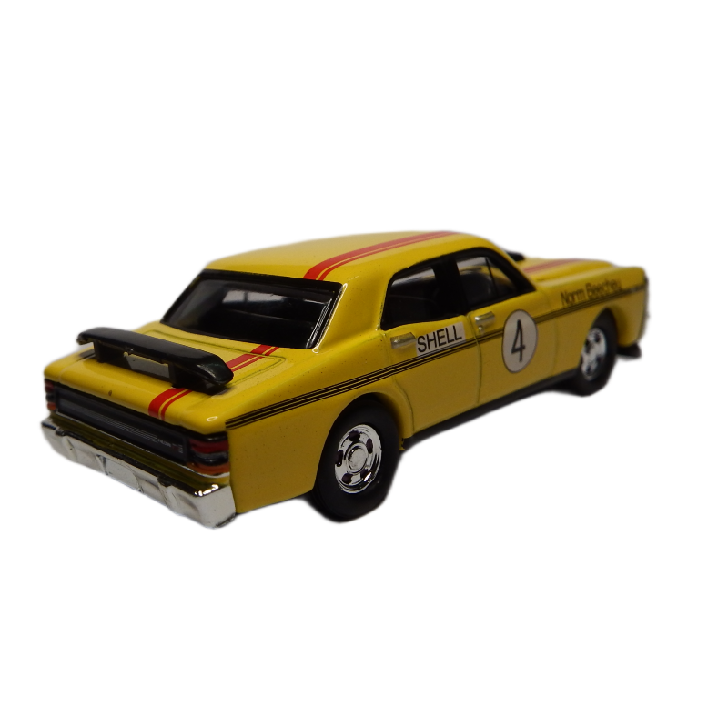 Yellow model car with red stripe and 'Shell' logo on a white background
