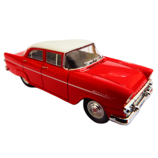Model of a red classic car with white roof on a white background