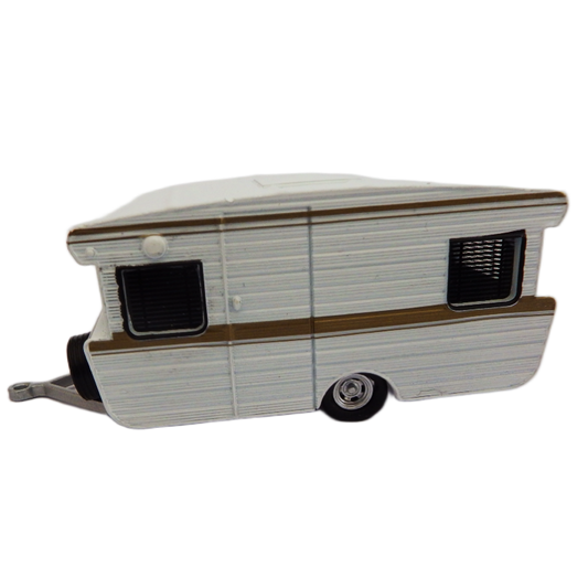Model of a vintage-1968 Vicount Caravan metalic silver on a white background