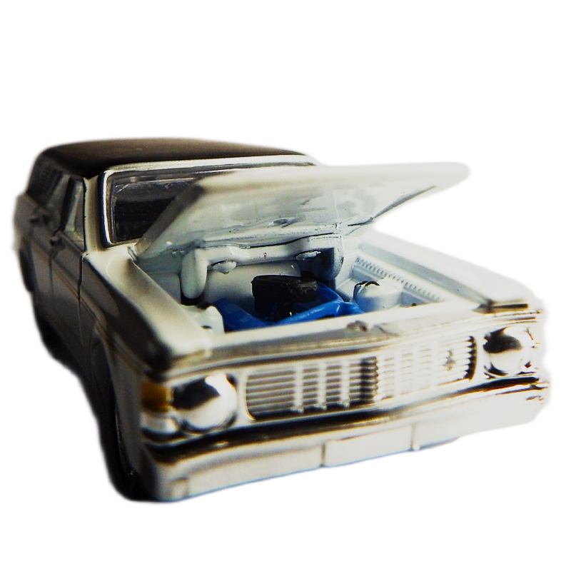 Model car with open hood on a white background