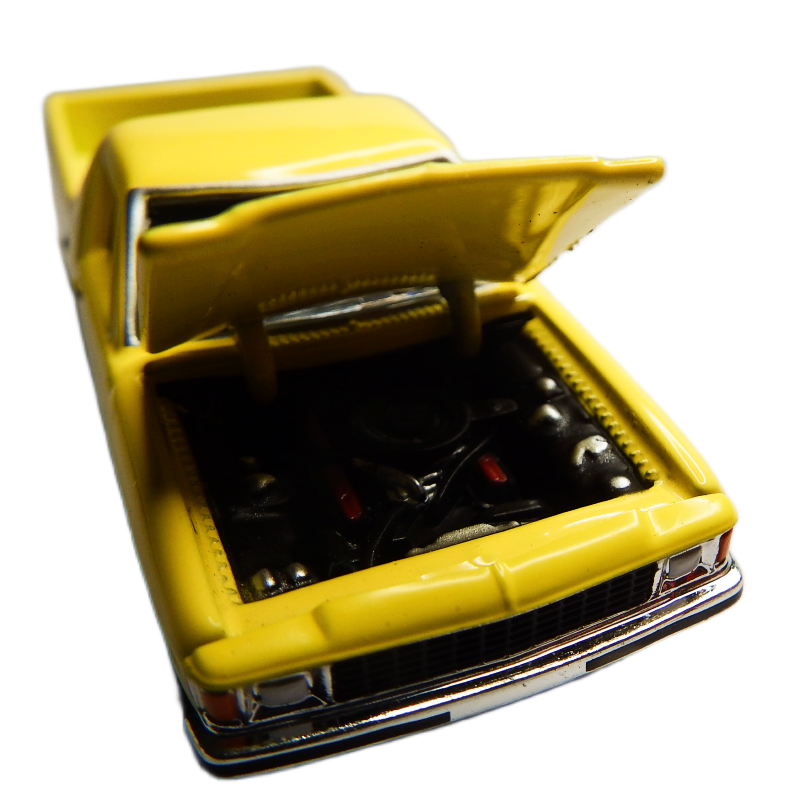 Yellow toy car with open hood on a white background
