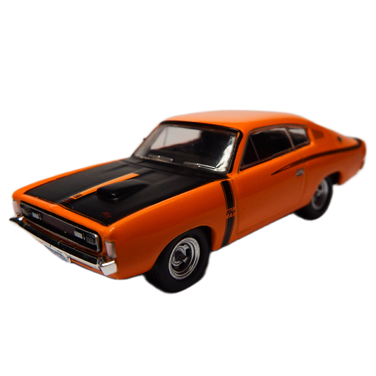 Orange and black model car on a white background