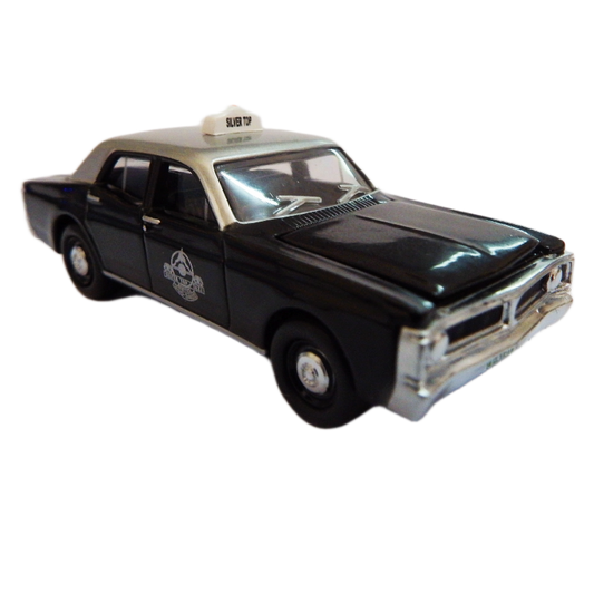 Model of a black silver top taxi XY Falcon car on a white background