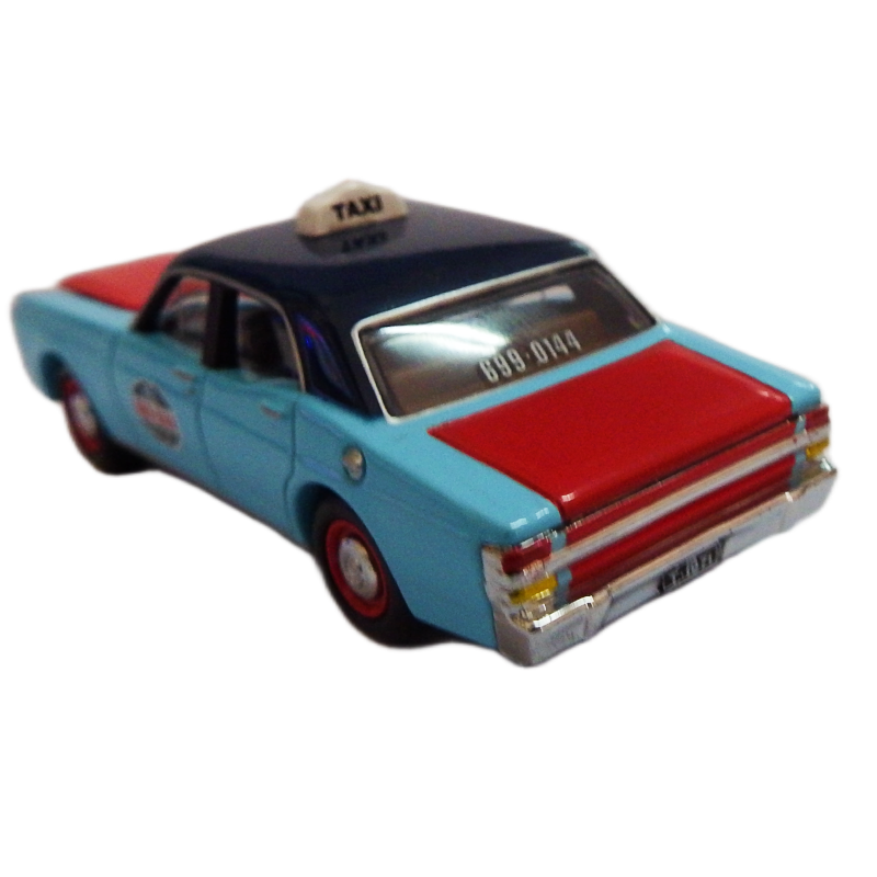 Model taxi car with blue and red design on a white background