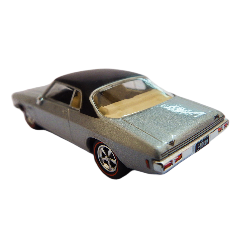 Cooee Classics Road Rager diecast model car 1:64 scale 1973 HQ Monaro LS 2 Door Silver with black roof Model car, facing side back Model car on a white background