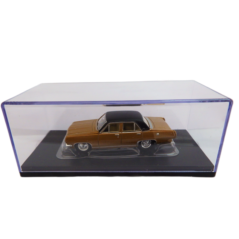 Model car in a clear display case on a white background
