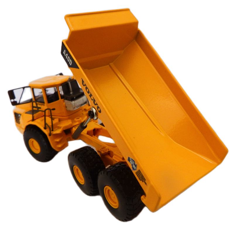 Toy Cooee classics articulated dump truck with volvo branding on a white background