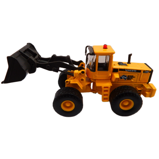 1:87 cooee classics volvo wheel loader  with black blade on a white background