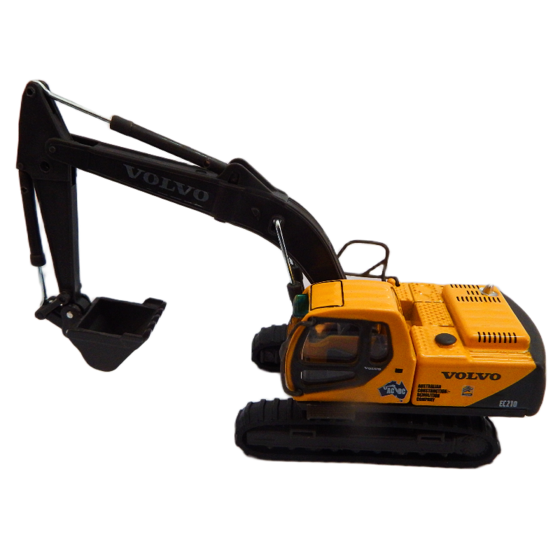 Yellow Volvo excavator model on a white background