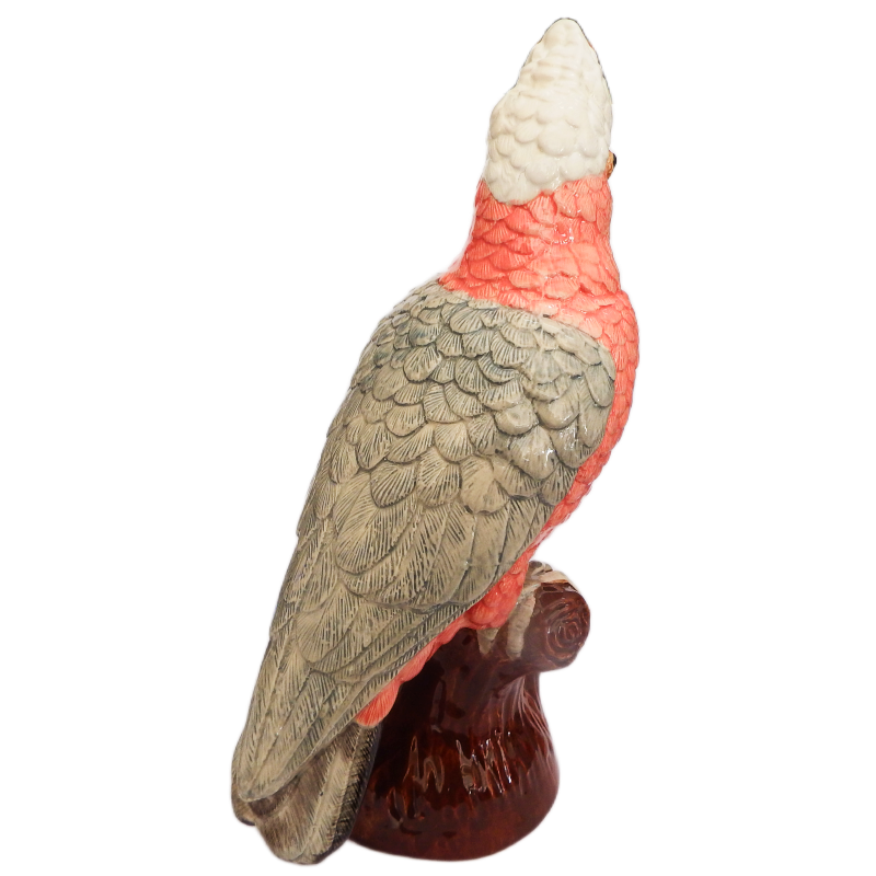 Ceramic Galah Cockatoo figurine with a white top pink and grey body on a white background