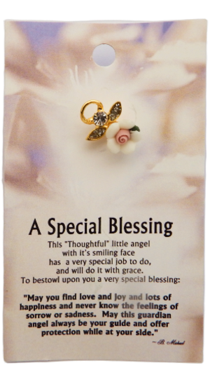Card with angel charm and blessing text on a floral background