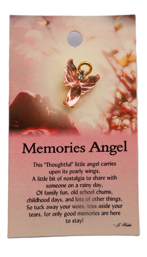 Memories Angel charm on a pink card with text