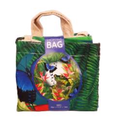 Colorful tote bag with a parrot design and a visible brand label on a white background