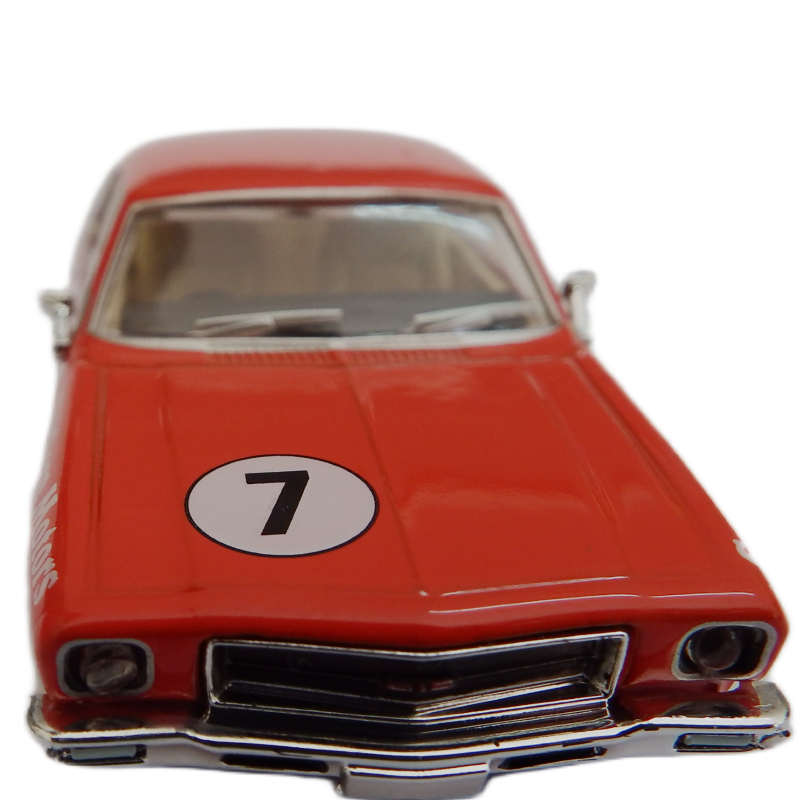 Red model car with number 7 on a white background