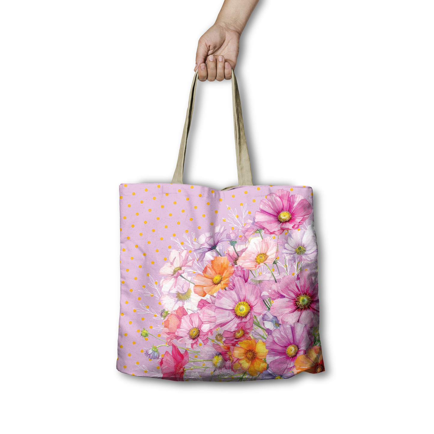 Tote bag with floral design held by a hand on a white background
