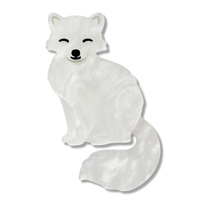 White arctic fox toy on a white background