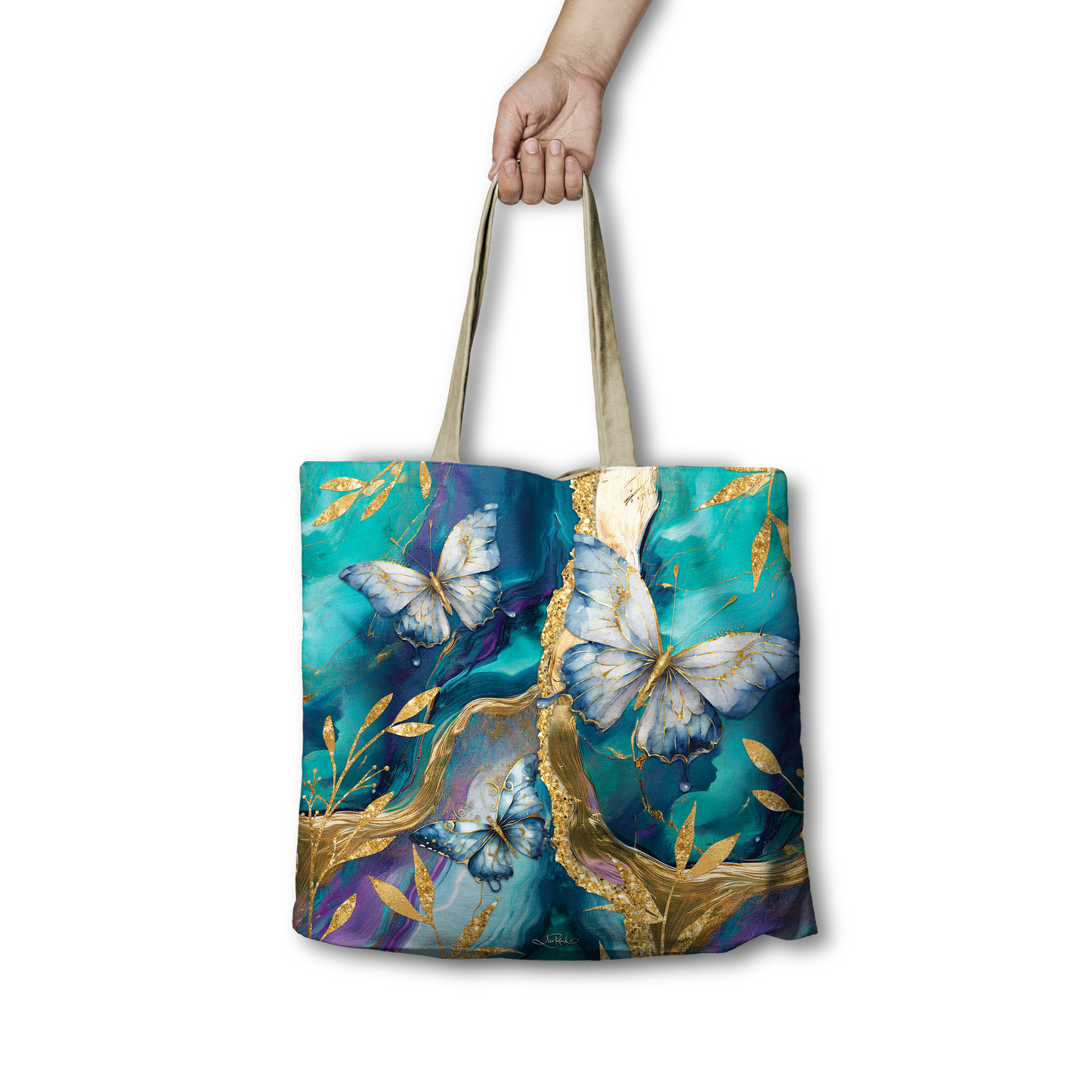Tote bag with butterfly design held by a hand on a white background