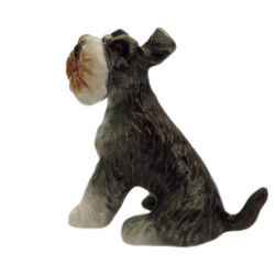 large schnauzer sitting ceramic miniature figurine