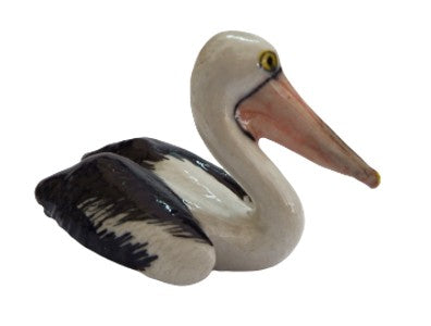 Pelican sitting ceramic miniature figurine