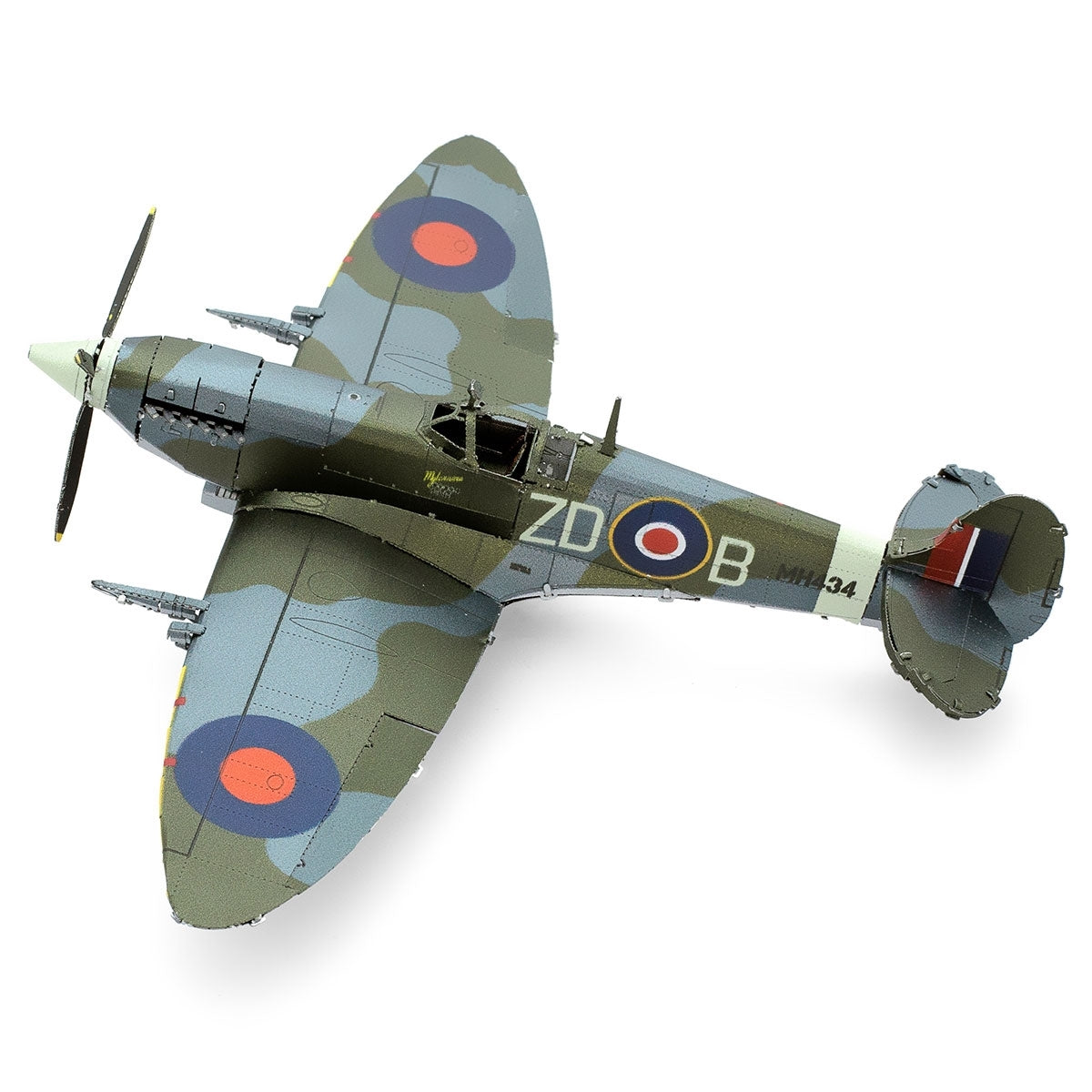 Model of a vintage military aircraft with camouflage paint scheme on a white background