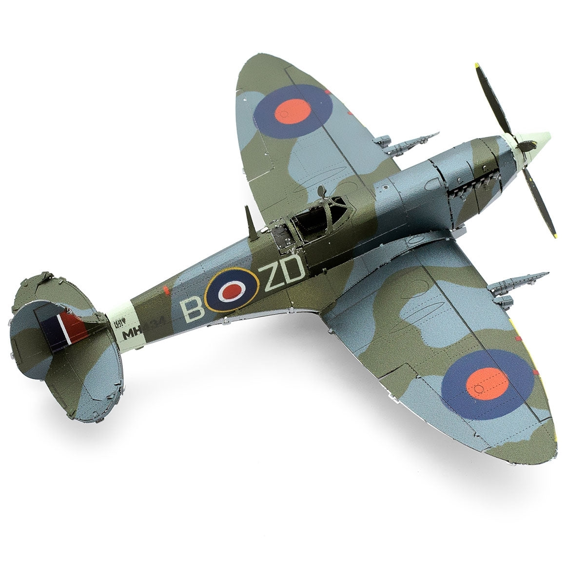 Model of a World War II-era fighter plane with camouflage pattern on a white background