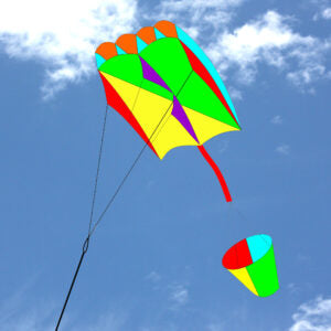 Colorful kite flying against a blue sky with some clouds.