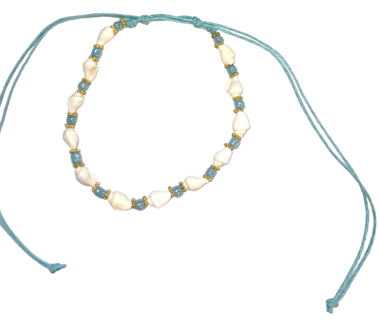 A278 anklet! The unique design features shells and pearly beads on a double cotton cord.