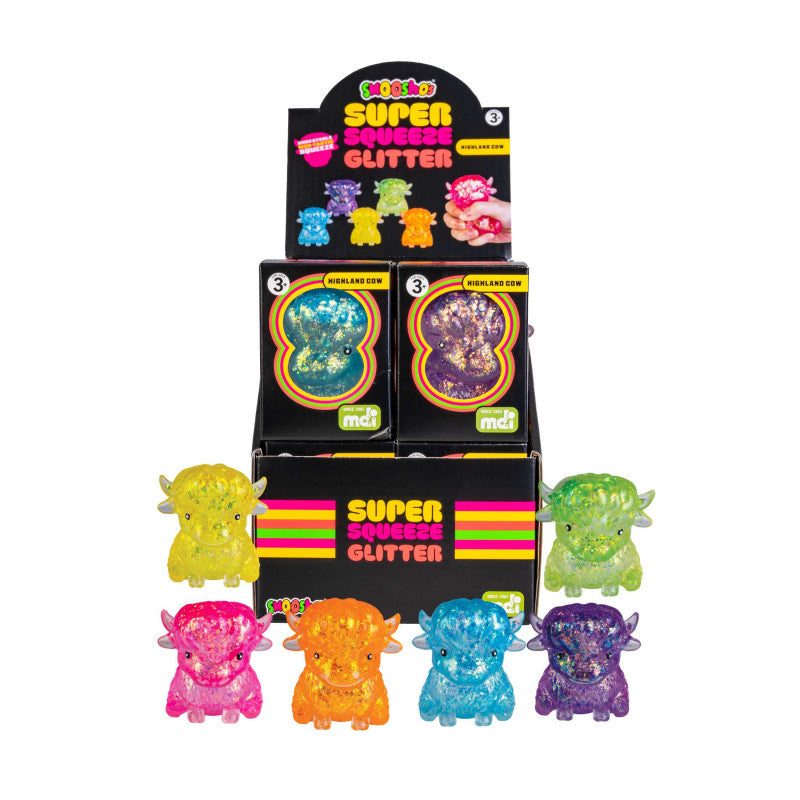 Display of colorful glittery highland cows with packaging labeled 'Super Glitter' on a white background.