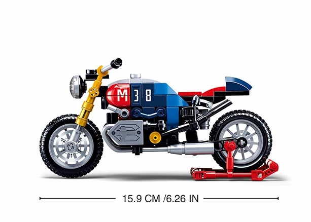 Toy motorcycle model with dimensions displayed on a white background