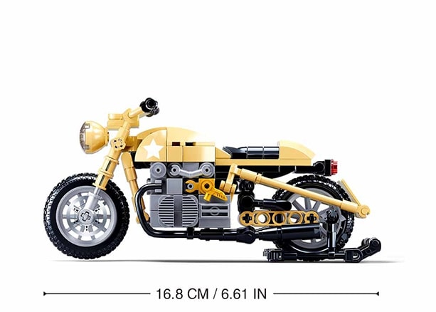 Toy motorcycle model with dimensions indicated on a white background