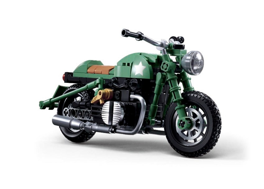 Green motorcycle model made of interlocking bricks on a white background