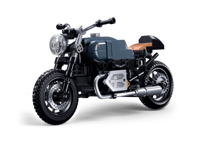 Model motorcycle made of interlocking bricks on a white background
