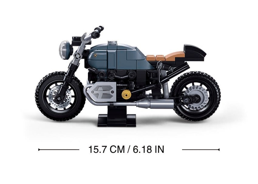 Toy motorcycle model with dimensions displayed on a white background