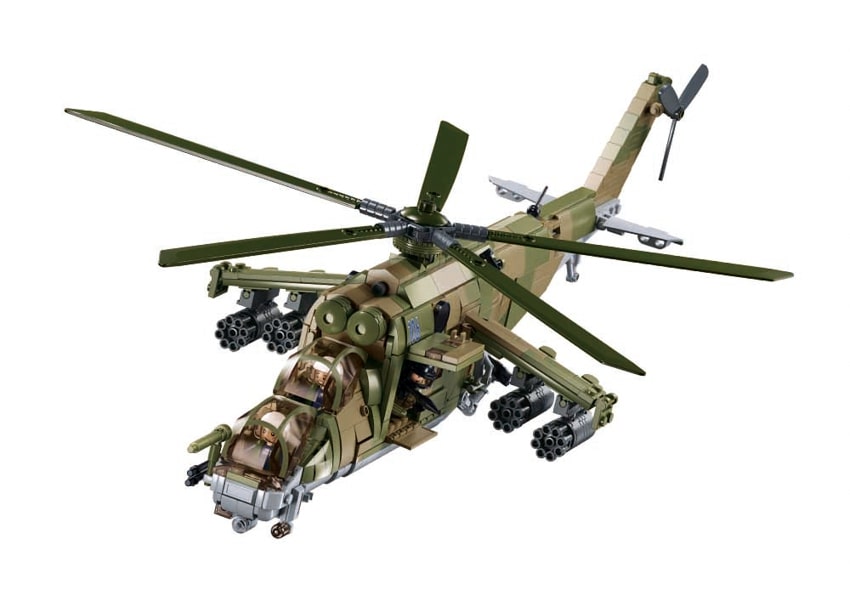 Model helicopter with camouflage pattern on a white background