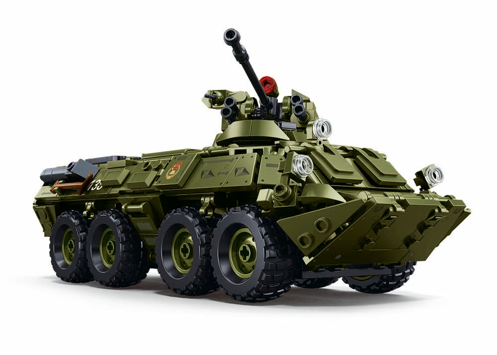 Green military tank model on a white background