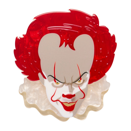 Erstwilder Jewellery Brooch  character Pennywise  From the Movie IT with a design of a clown's face on a white background
