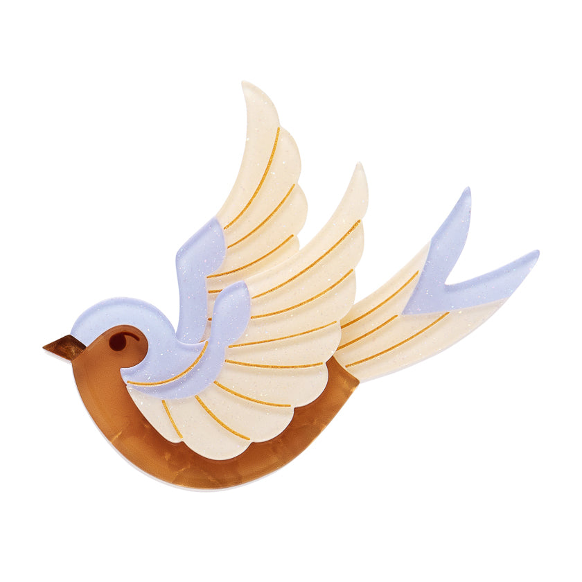  stylized bird Erstwilder Broochwith white and blue feathers on a white background