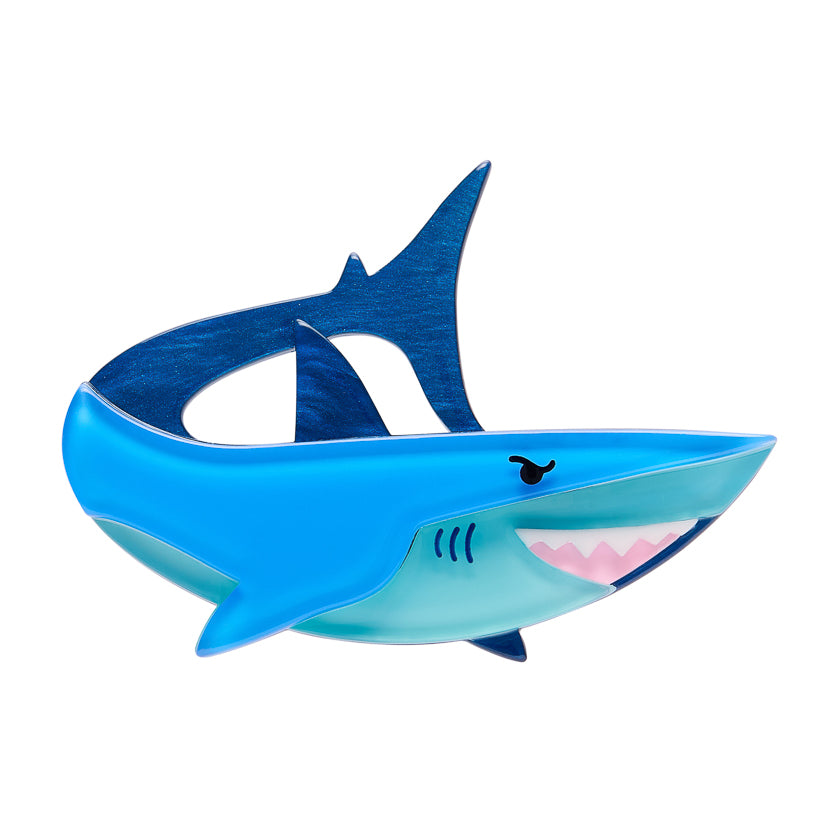 Blue shark-shaped Erstwilder Brooch on a white background