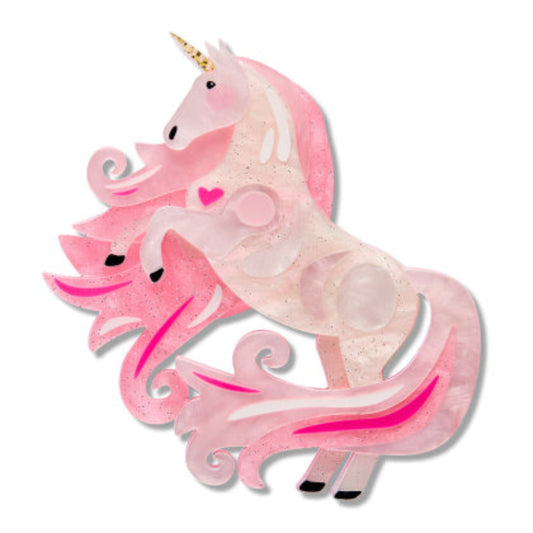 Pink unicorn with a heart on a white background