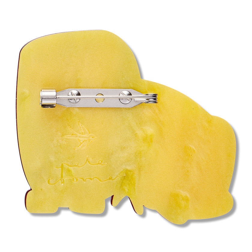 Yellow  back of lion and mouse brooch Erstwilder logo and Pete Cromer signature embedded in the back of the brooch with a metal clip on a white background