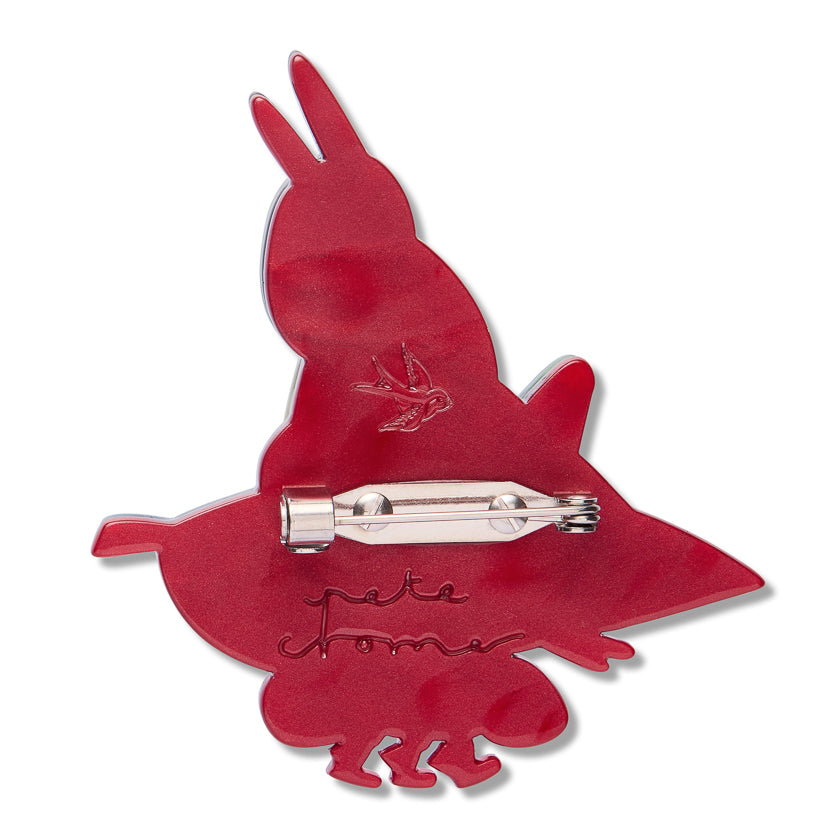 back of meal prep brooch winth erstwilder logo and pete cromerer signature imbedded in back of brooch with stainless steel clip and clasp