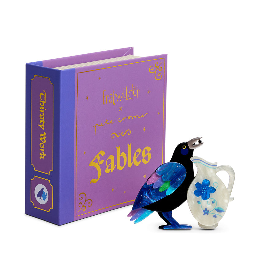 Purple book titled 'Fables' with a illustration of a bird and a jug on a white background